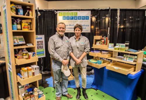 Photo of ShelfHarmony owners at a trade show booth